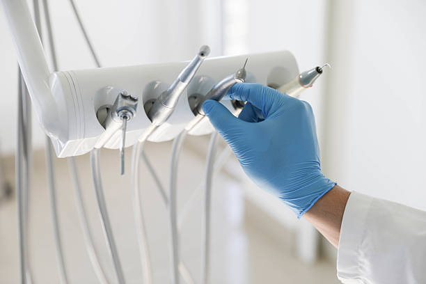 Professional Tooth Extraction technician working in Tipp City, OH